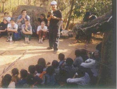 Subba Preaching in Village